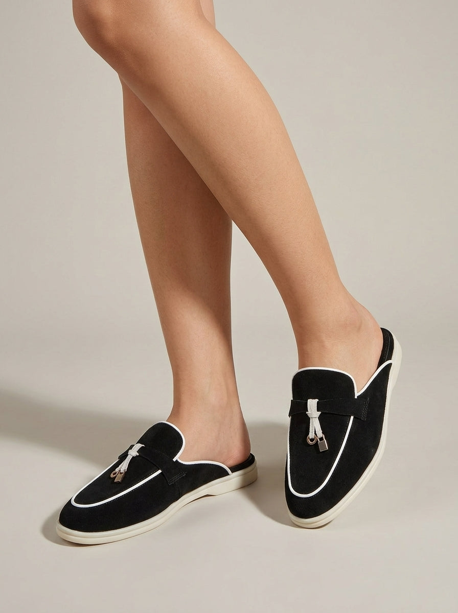 Women's Suede Backless Loafers with Rounded Toe and Metal Tassel Detail