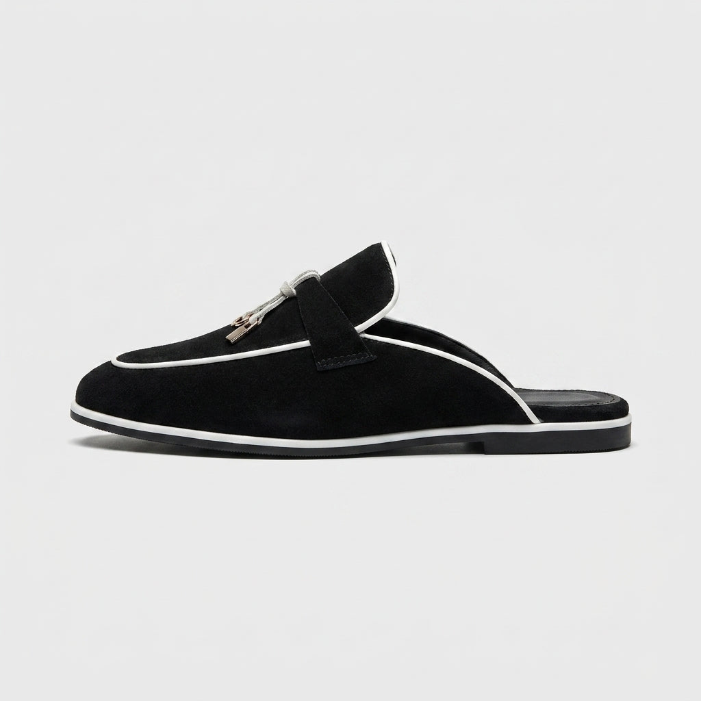 Women's Suede Backless Loafers with Rounded Toe and Metal Tassel Detail