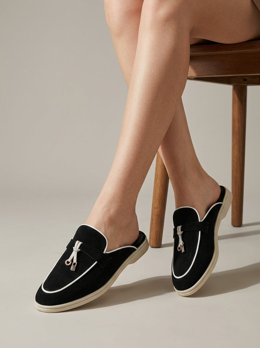 Women's Suede Backless Loafers with Rounded Toe and Metal Tassel Detail